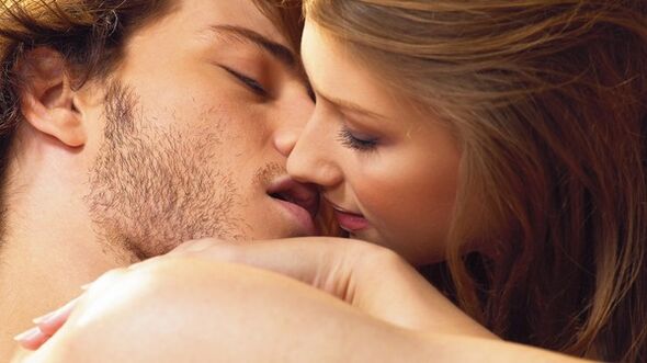 woman kisses man with potency products